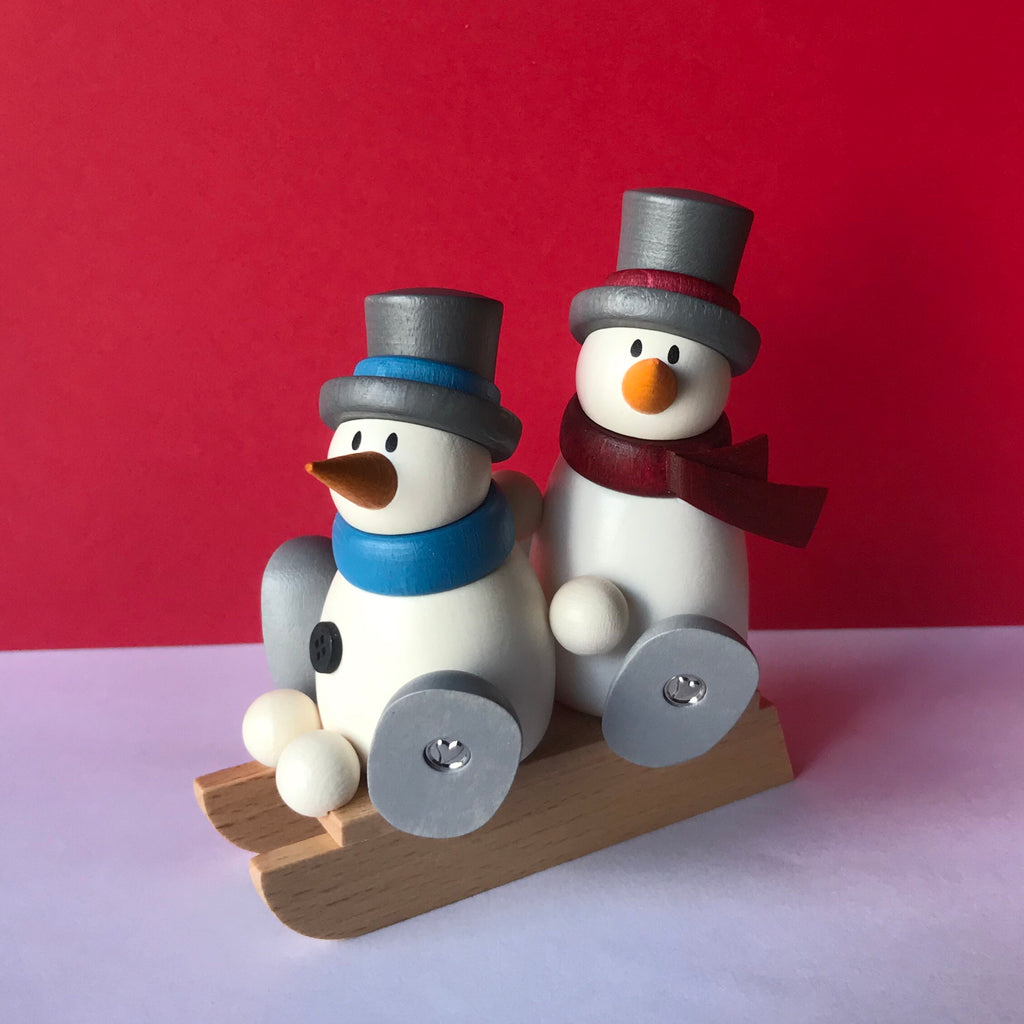 Snowmen on Slegde