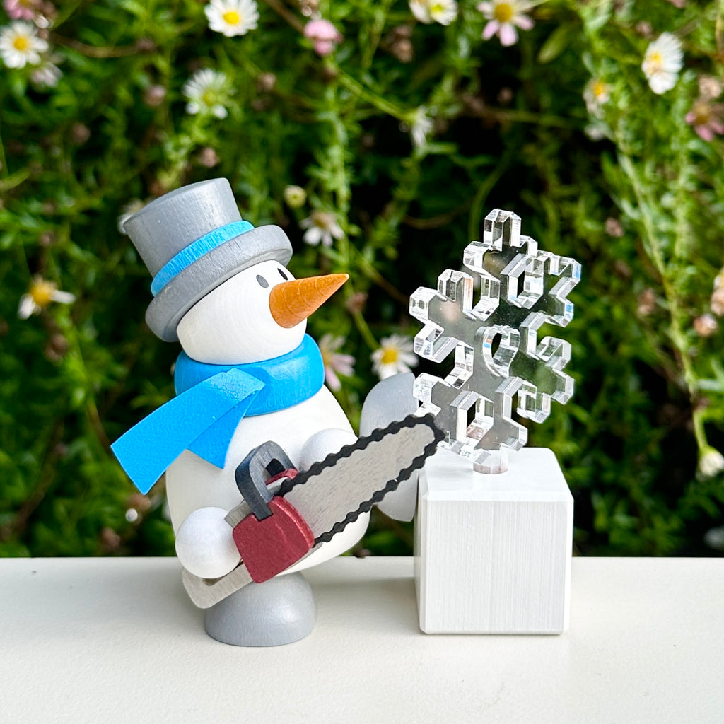 Snowman making Ice Sculpture